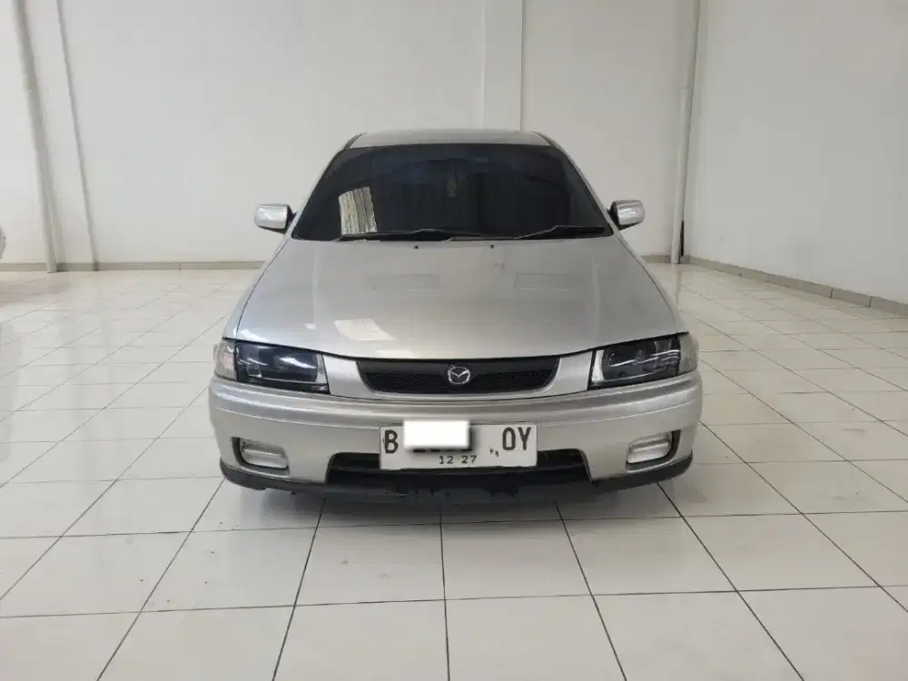 Mazda 323 familia th 1997
