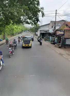 Dijual tanah ada bangunan strategis posisi pinggir jalan raya  ar