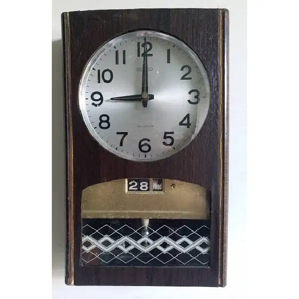 Vintage kuno Seiko Japan era 60'an jam dinding transistor pakai tangga