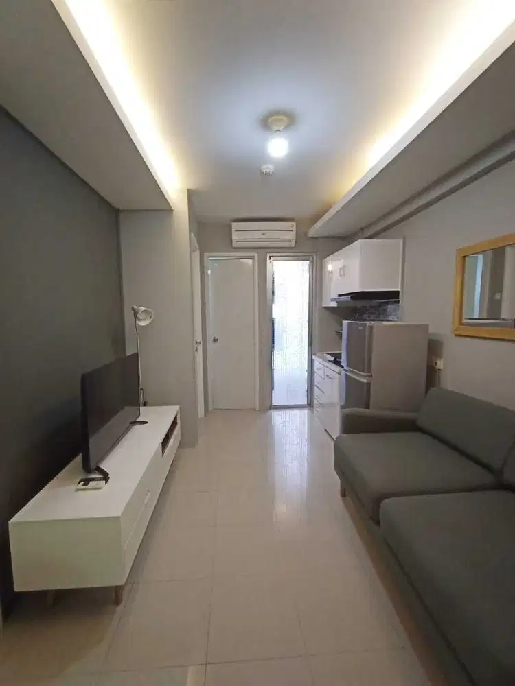DI JUAL APARTEMENT BASSURA FULLY FURNISHED DENGAN VIEW KOLAM RENANG