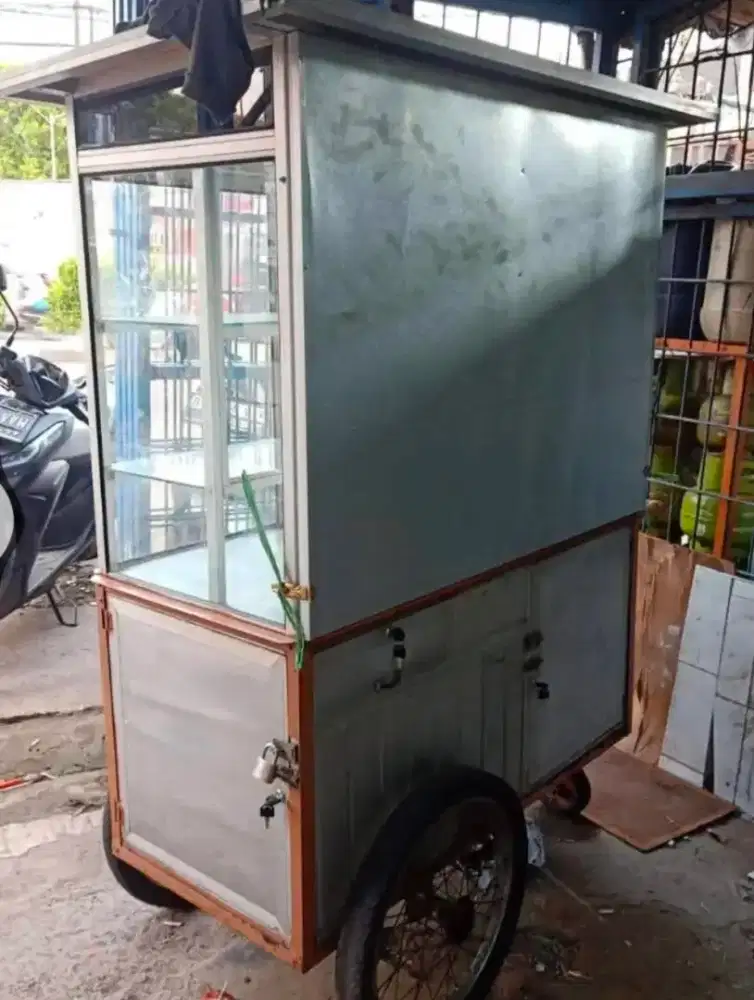 Gerobak roda 3 bahan almunium sudah full kaca