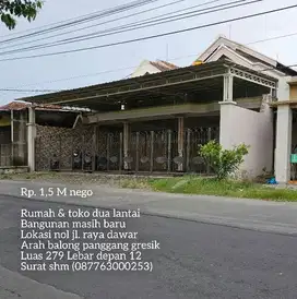 Jual rugi rumah & toko dua lantai bangunan masih baru