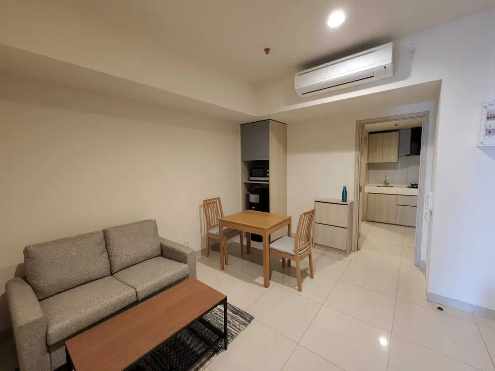 Apartemen 2BR 56 m² Furnished Tengah Kota Lippo Cikarang, Hanya 100Jt
