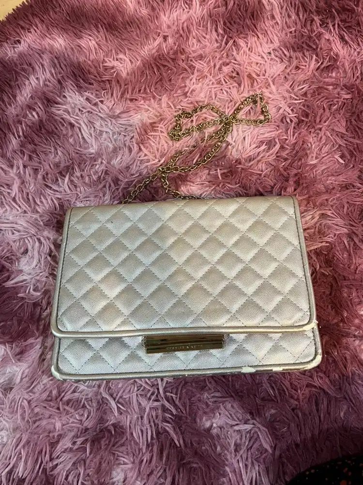 Tas wanita warna putih mutiara