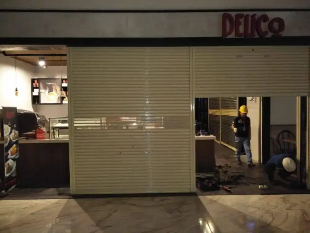 tukang service rolling door