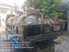 Buang puing bongkaran rumah