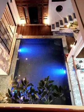 rumah seperti villa di gresik menganti ada kolam renang bonus furniture dan luas 543