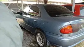 Mobil madza familia docs thn 1998