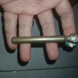 Alat pembuka botol kuno antik