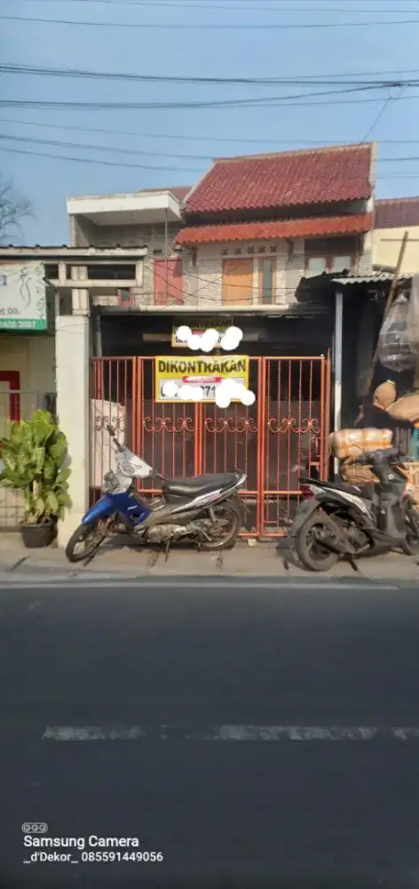 Rumah dikontrakan buat  kantor/travel agent dll  dipinggir jalan raya.