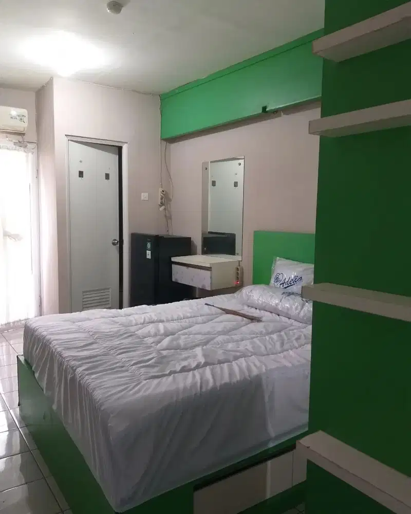 The green apartment pramuka city studio furnish