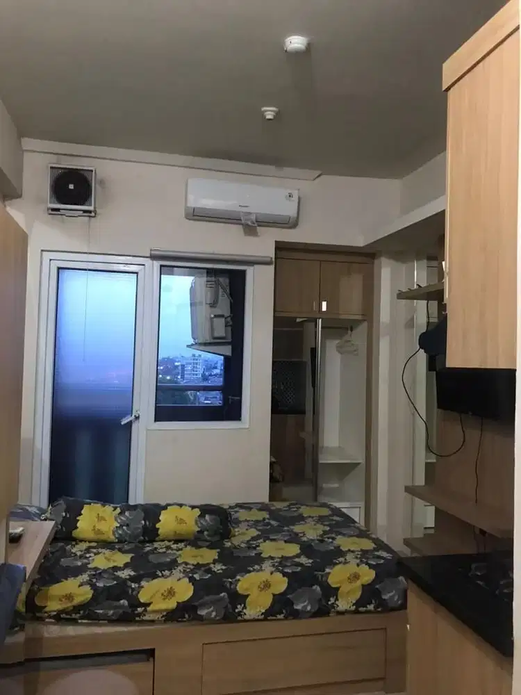 Apartemen studio the green pramuka city harian