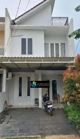 Rumah dalam cluster gapura menteng bintaro sektor 5.