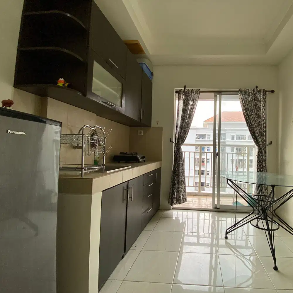 Disewakan semi furnish tipe 2br apartment mediterania garden res 2