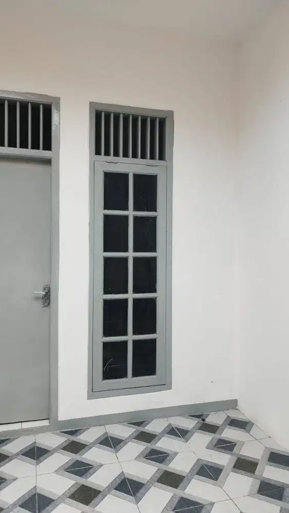 Rumah kontrakan kecil dan nyaman.