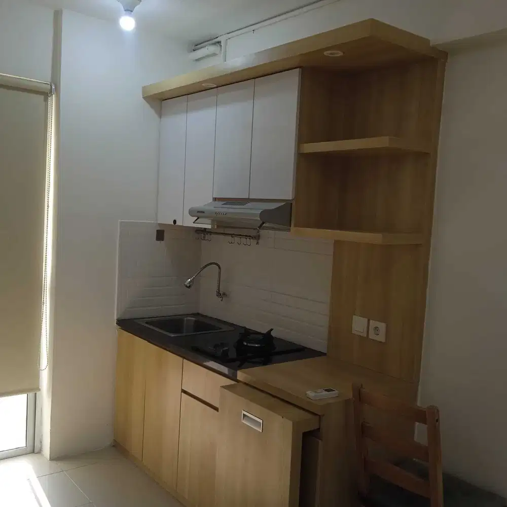 Disewakan apartemen bassura studio kosongan ada kitchen set