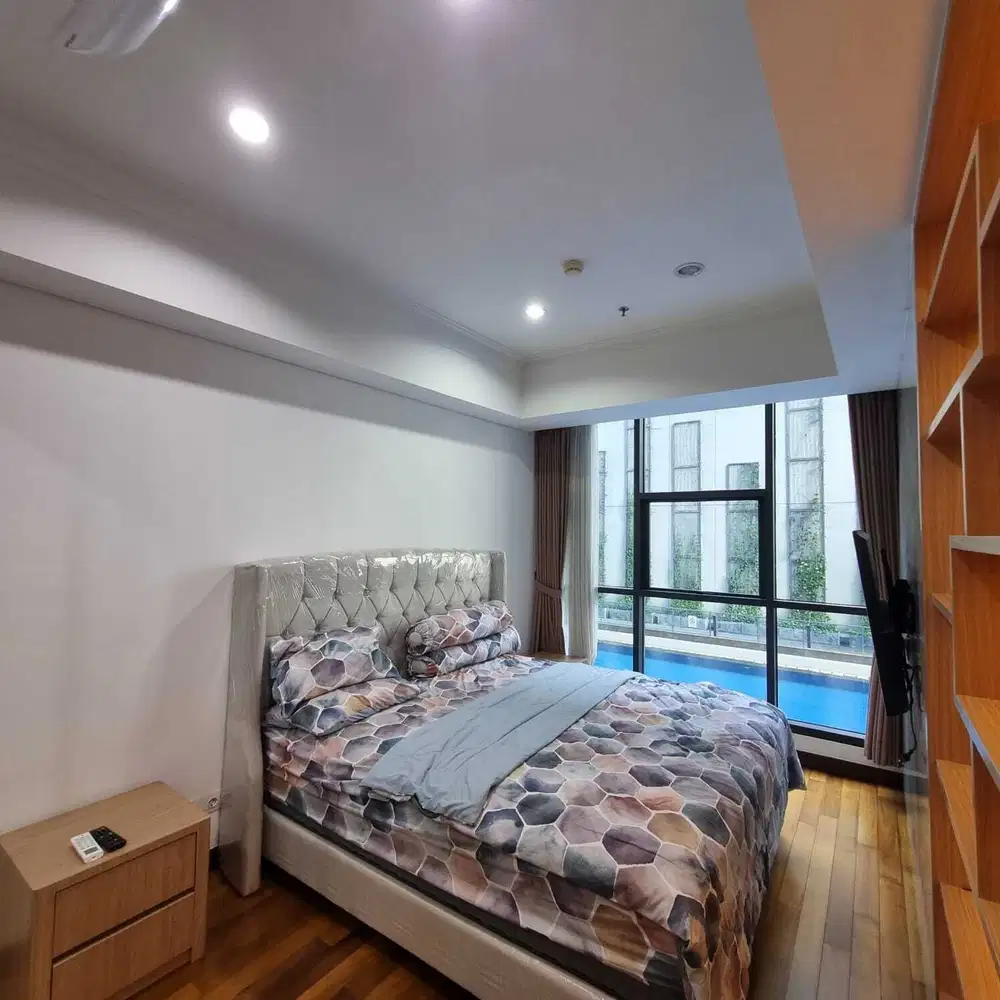 Jual Rugi 2BR  67m2 View Swimming Pool di Casa Grande Phase 2 Kokas