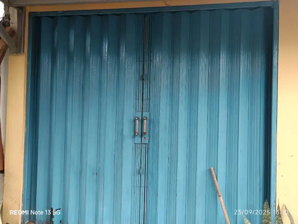 Rolling door bekas buka warung