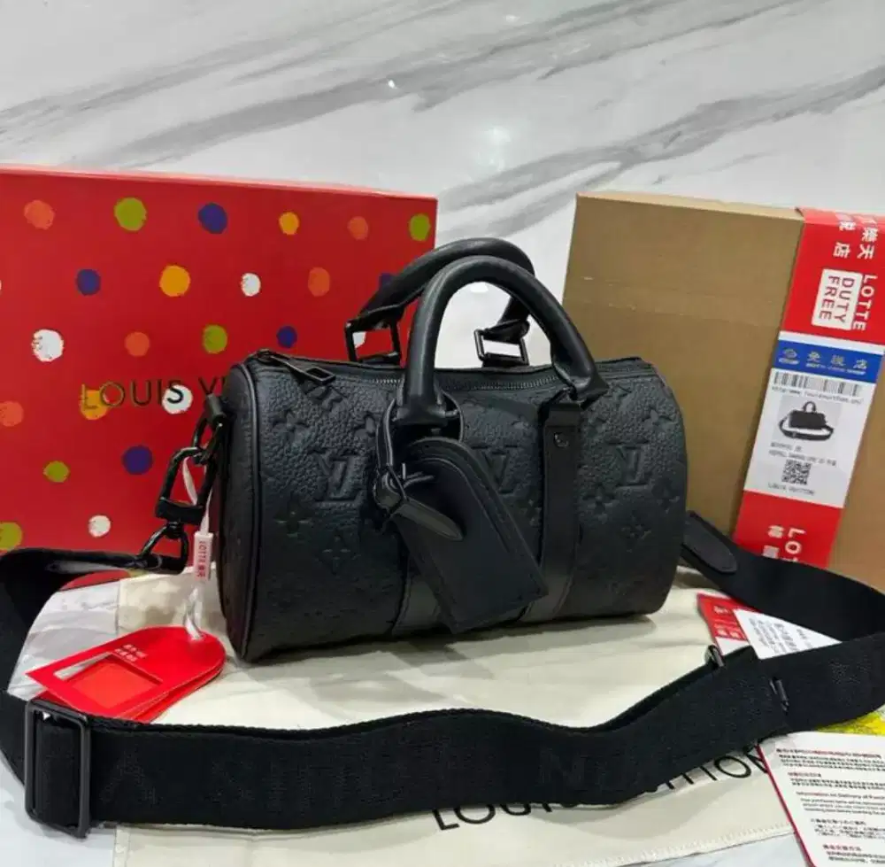 TAS LV KEEPALL BANDOULIERE 25 MONOGRAM EMBOSSED LEATHER
