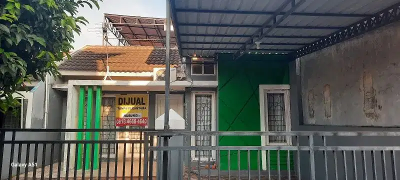 DIJUAL RUMAH  TENGAH KOTA BERNUANSA MINIMALIS LOKASI DALAM PERUMAHAN