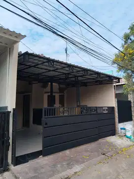 RUMAH TAMAN WIGUNA SIAP HUNI STRATEGIS, PERUMAHAN ONE GATE SISTEM