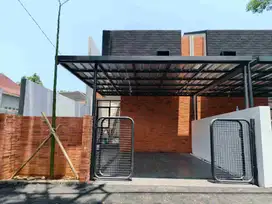 RUMAH BARU SIAP HUNI DIJALAN UTAMA ARCAMANIK