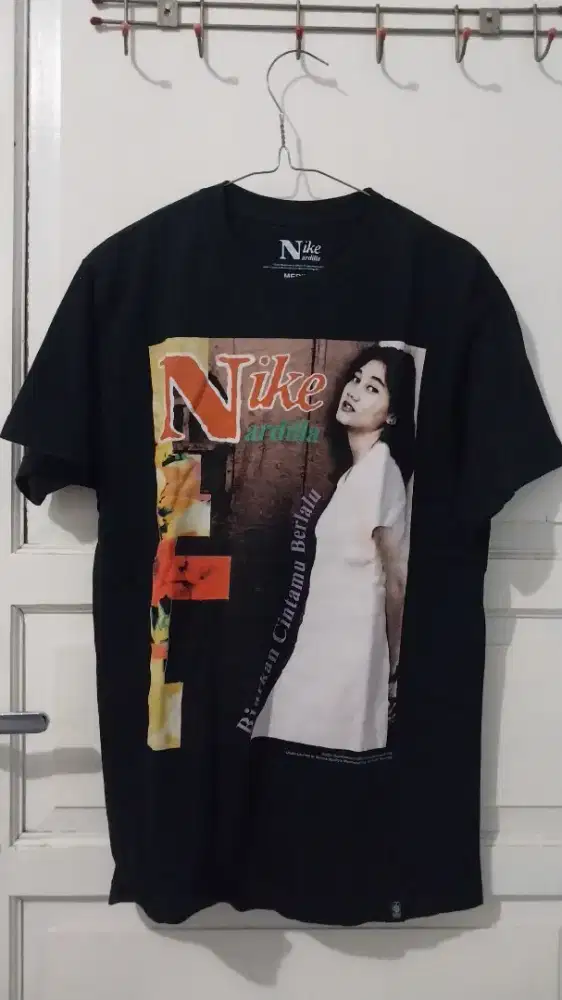 Kaos nike ardilla original musica