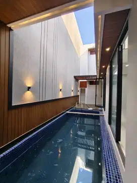 RUMAH BARU GRESS AREA BARUK MERR SURABAYA TIMUR ADA KOLAM RENANG
