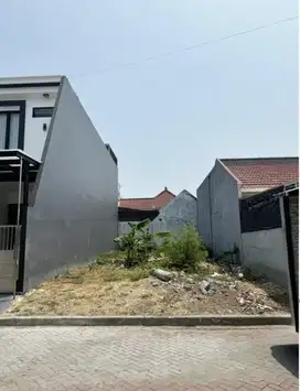 Tanah pantai mentari one gate