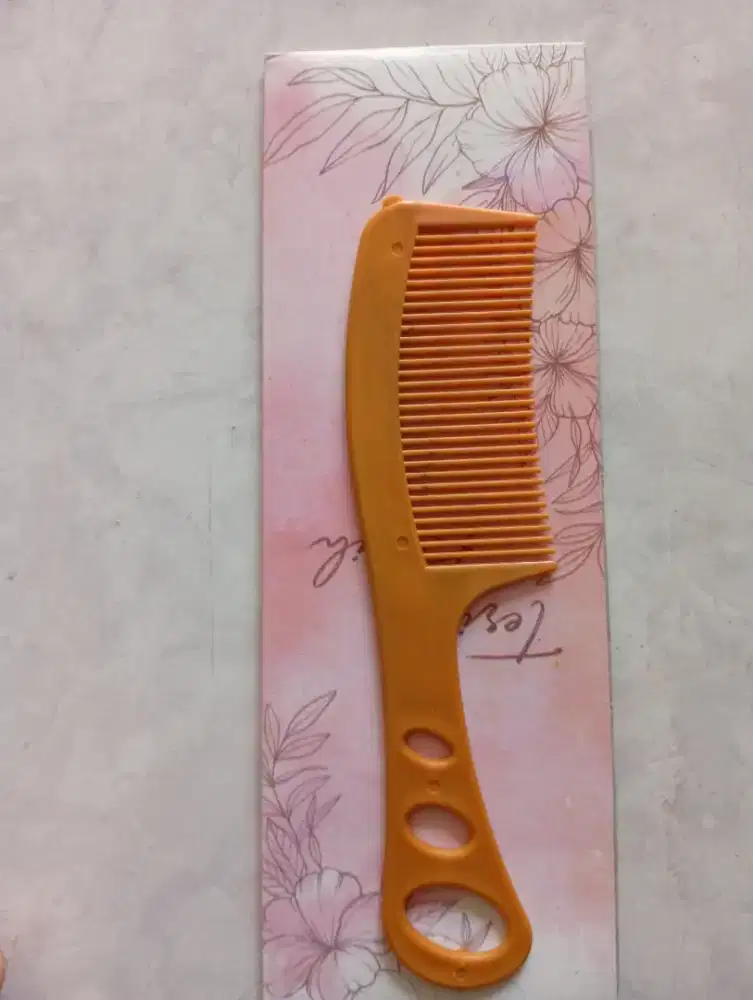 Souvenir sisir rambut