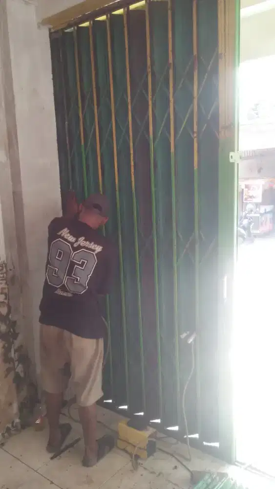 spesialis servis rolling door