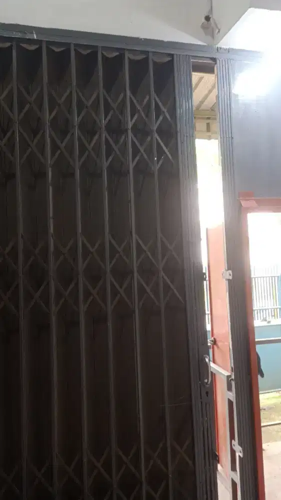 tukang perbaikan rolling door folding gate murah