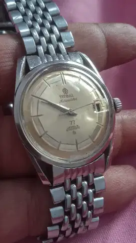 Titoni 77 gold coin