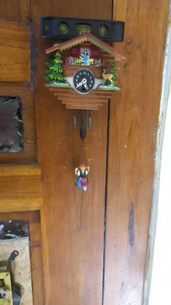 Jam kikuk cuckoo mini lubang 1