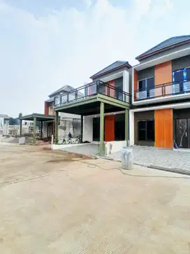 Townhouse strategis pinggir jalan raya dan dekat pintu tol jatiwarna, promo kpr tanpa dp