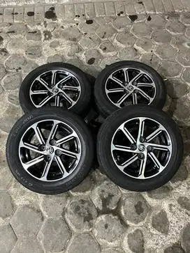 Velg calya original r14 besertta ban bridgestone dan laufeen 2023