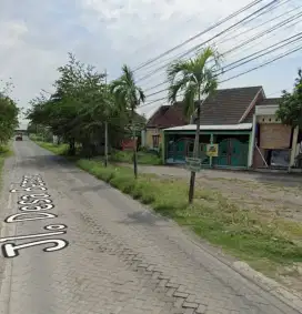 Jual rumah pinggir jalan menganti