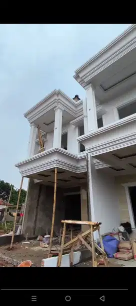 Cluster dua lantai selangkah dari jalan raya