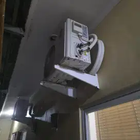 AC merek LG 1/2 PK