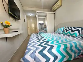 Strategis Sewa Studio Furnished Bagus Akses Kolam Renang, Gym, EV Charger Dekat ke Tol & Mall Central Park, Neo Soho, Taman Anggrek Madison Park