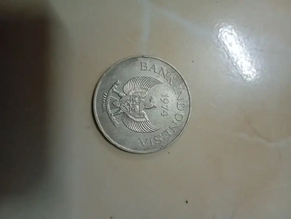 Uang koin 2000 tahun 1974 bergambar macan jawa
