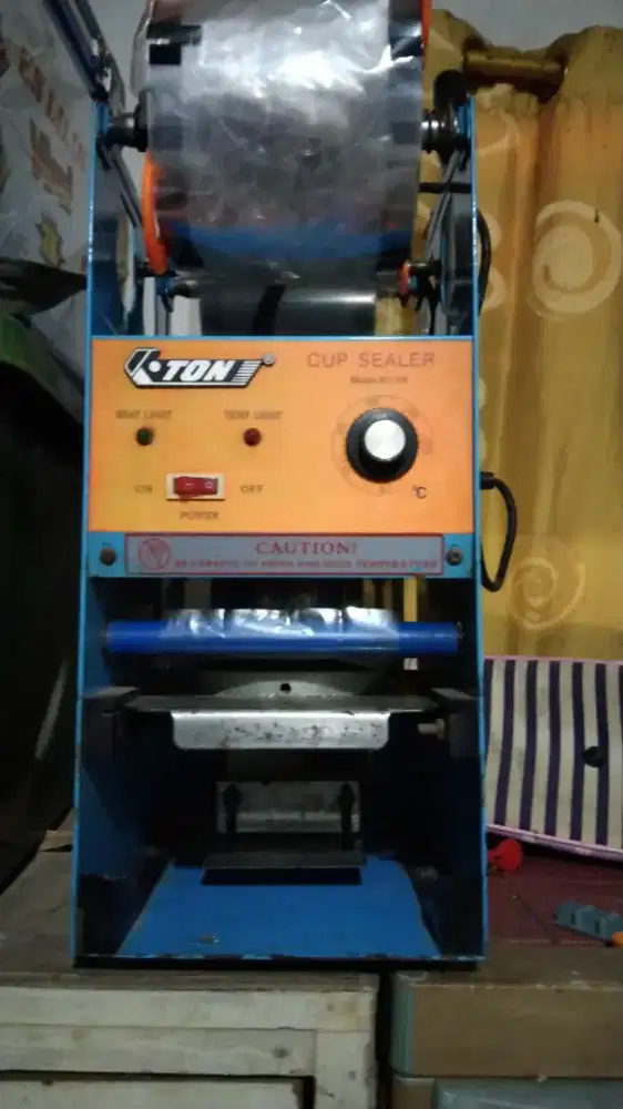 mesin cup Sealer merk Eton