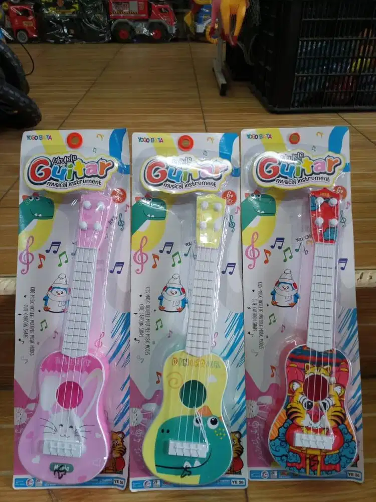 mainan anak ukulele guitar press