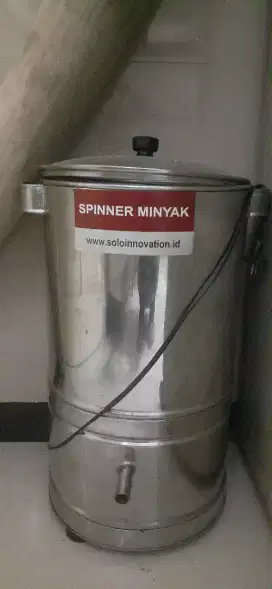Spinner peniris Minyak