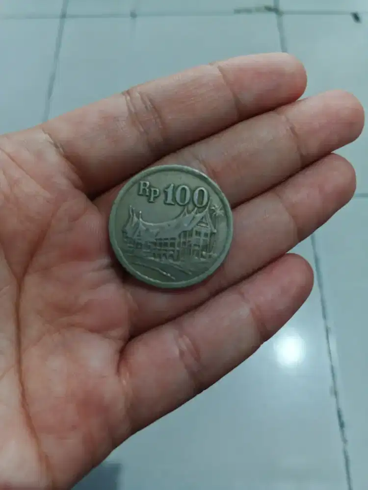 Uang koin kuno lama 100 rupiah rumah gadang 1973