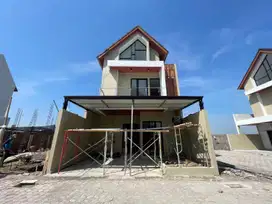 Rumah 2 Lantai Modern dengan Lingkungan Asri di Triyagan