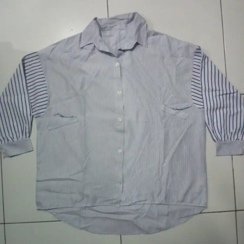 Kemeja garis biru