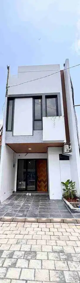 rumah 2 lantai bisa KPR dekat tol kukusan Beji Depok jabar