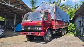 Nissan CK12 tronton bak besi terbuka Merah terawat