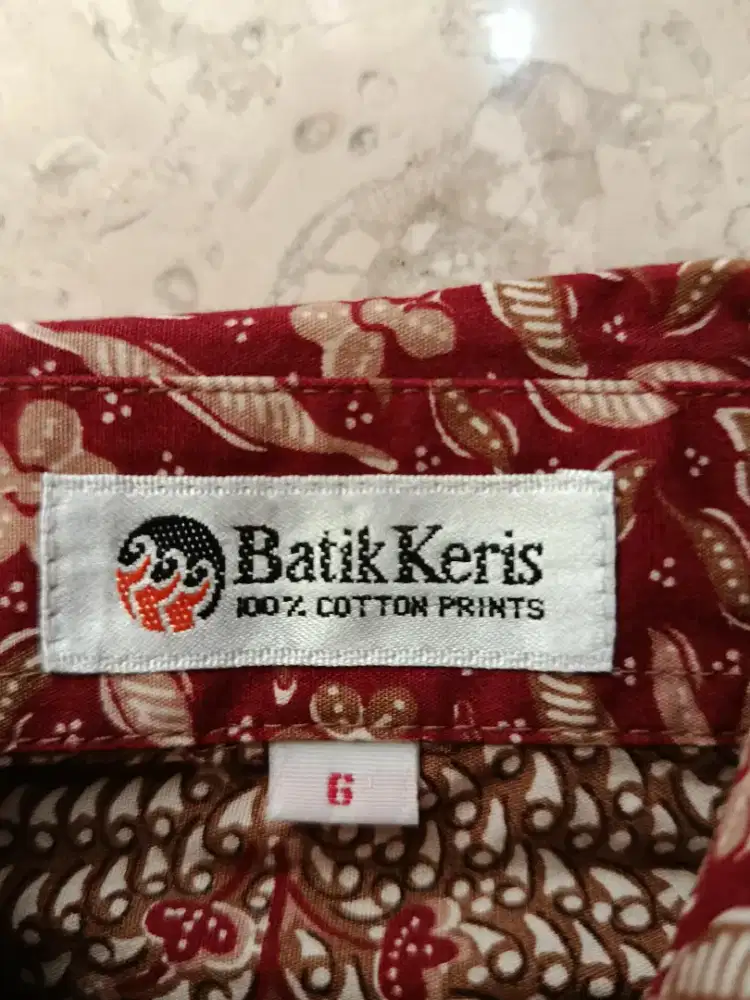Baju batik keris warna merah